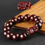 Rosewood Golden Satinwood Pendant - Traditional Cultural Jewelry - Red Leaf Forest