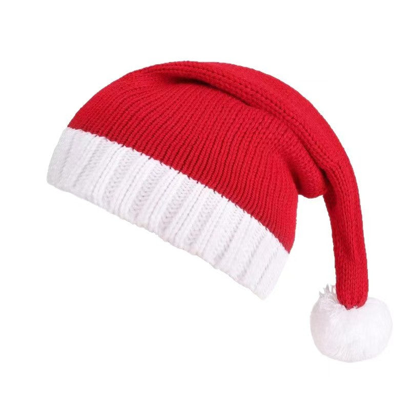 Red Santa hat with white trim and pom-pom"