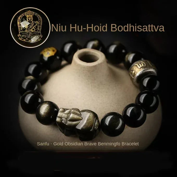 Close-up of natural gold obsidian beads with golden patterns and polish