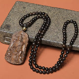 Ancient Yisumu Agarwood Pendant - Traditional Cultural Jewelry - Red Leaf Forest