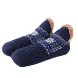 Navy blue plush socks with snowflake pattern"
