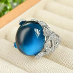 Elegant Egg-Shaped Gemstone Ring for Women – Crystal Cabochon with Diamond Halo Band - Red Leaf Forest