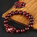 Rosewood Golden Satinwood Pendant - Traditional Cultural Jewelry - Red Leaf Forest