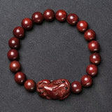 Rosewood Golden Satinwood Pendant - Traditional Cultural Jewelry - Red Leaf Forest