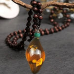 Resin Teardrop Pendant with Natural Inclusions - Red Leaf Forest