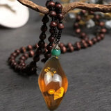 Resin Teardrop Pendant with Natural Inclusions - Red Leaf Forest