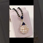 Blooming Prosperity Crystal Pendant Necklace - Handcrafted Ruby and Sapphire Gemstone Jewelry with Shell Flower Design
