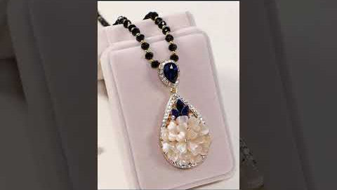 Blooming Prosperity Crystal Pendant Necklace - Handcrafted Ruby and Sapphire Gemstone Jewelry with Shell Flower Design
