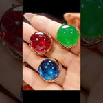 Elegant Egg-Shaped Gemstone Ring – Crystal Cabochon with Diamond Halo Band in Red, Blue and Green | Red Leaf Forest