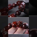 Five Pixiu sandalwood bead bracelet with traditional symbols, natural wooden beads, and adjustable design. Handcrafted cultural jewelry.