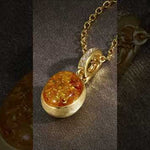 Product demonstration video of natural amber stone pendant necklace featuring genuine amber gemstone with warm golden honey tones set in luxurious gold plated frame. Video showcases the unique organic patterns within the amber stone, elegant gold plated setting with decorative bail, lightweight design, and versatile styling options. Perfect gift for gemstone lovers and nature enthusiasts.
